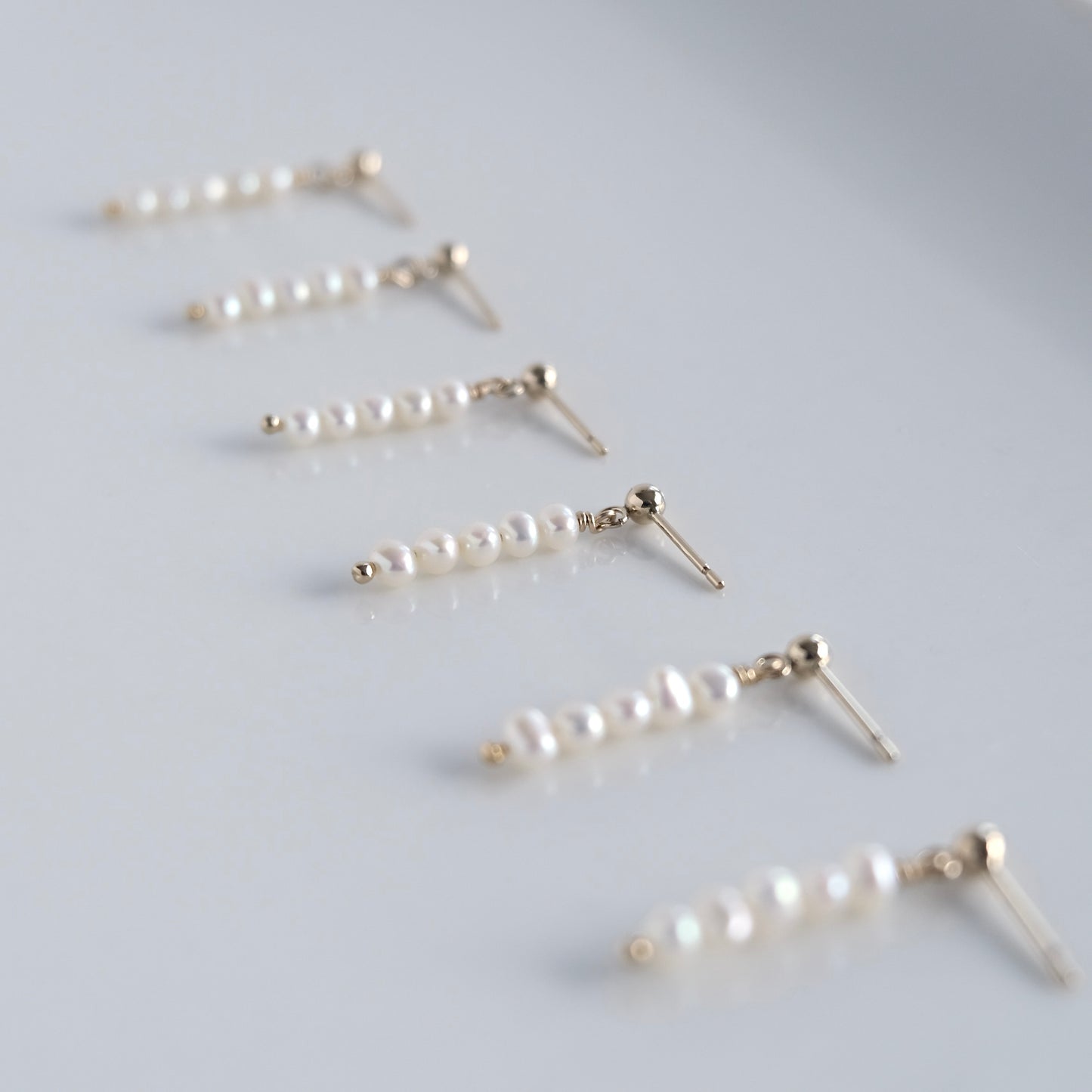 Five Pearl Earrings